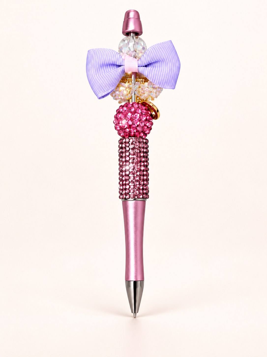 Pink and lavender handmade embellished pen with a bow