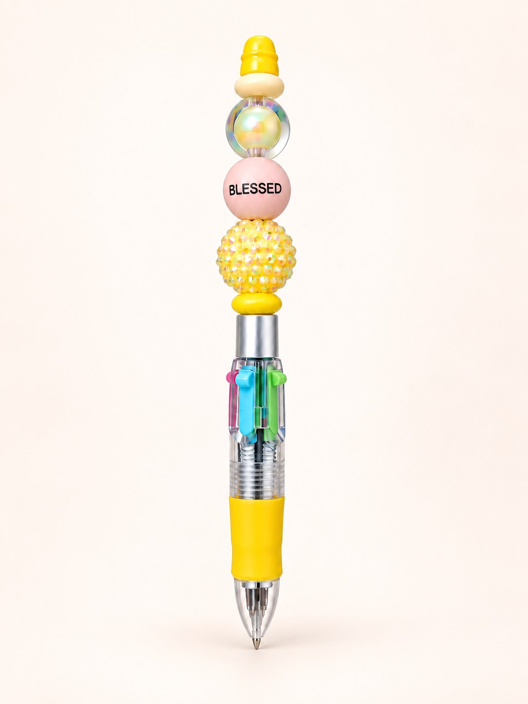 Yellow handmade multi-ink pen with a Blessed bead